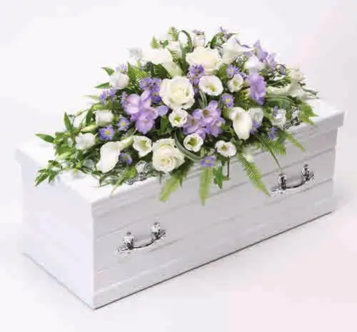 Children’s casket spray, blue and lilac, from our children’s flowers