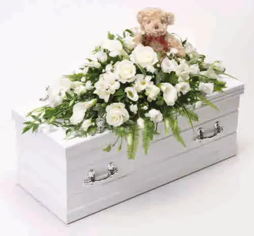Children’s casket spray with teddy bear, white, from our children’s flowers
