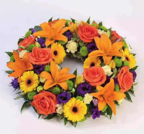 Rose and lily wreath, vibrant, from our wreaths